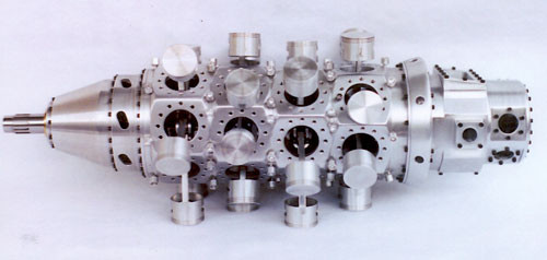 Bloco do motor com bielas e pistões visíveis (spannerhead.com)